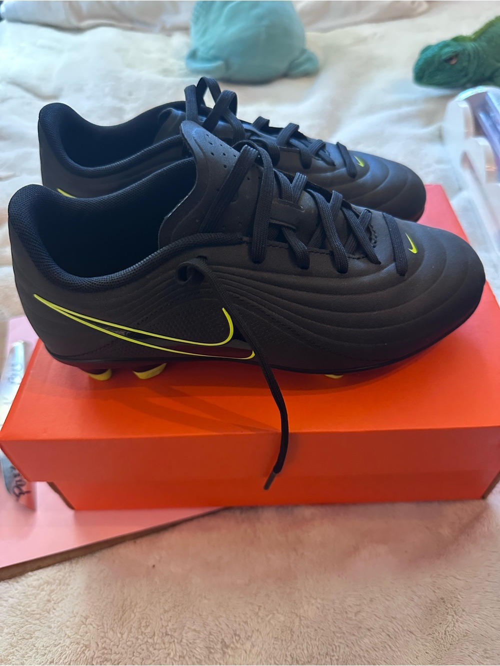 Nike Kids Black Athletic Soccer Cleats with Neon Yellow Swoosh